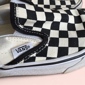 Vans Black and White Checkered Slip-On Sneakers